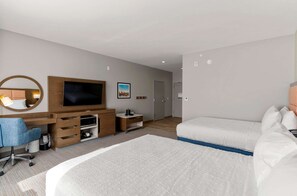 Desk, laptop workspace, iron/ironing board, bed sheets