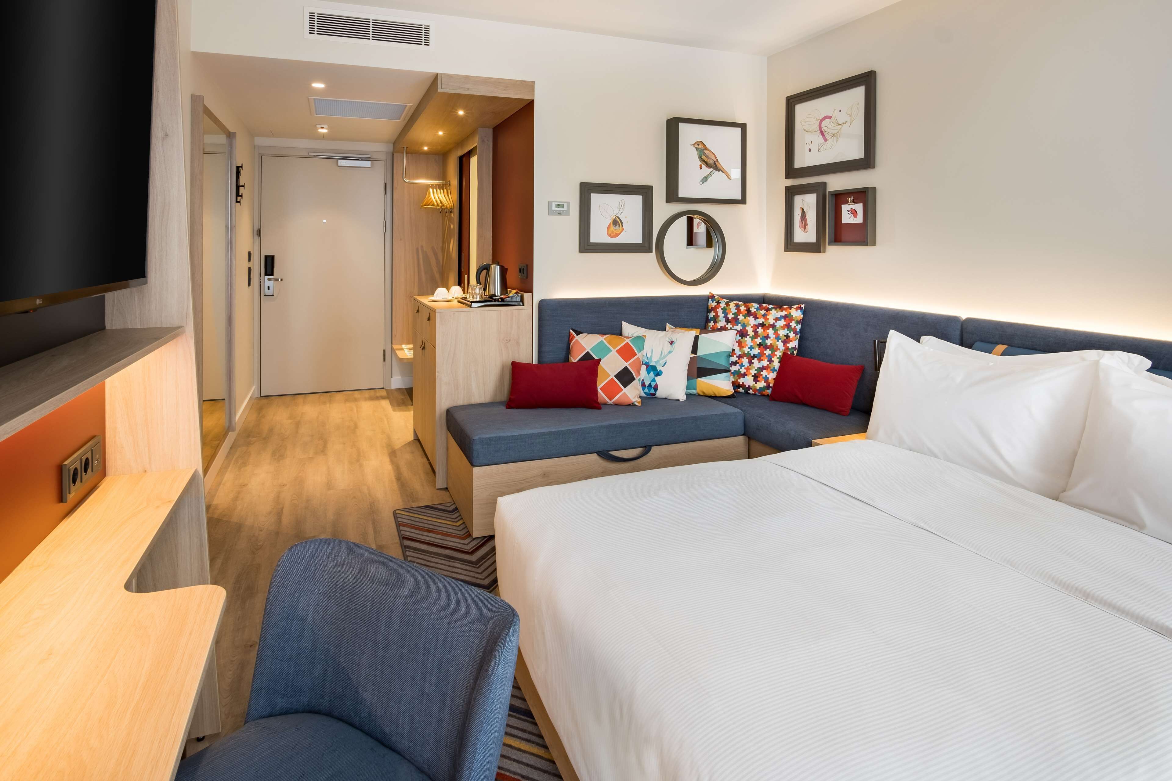 room, 1 queen bed with sofa bed | in-room safe, soundproofing, iron/ironing board, free cots/infant beds