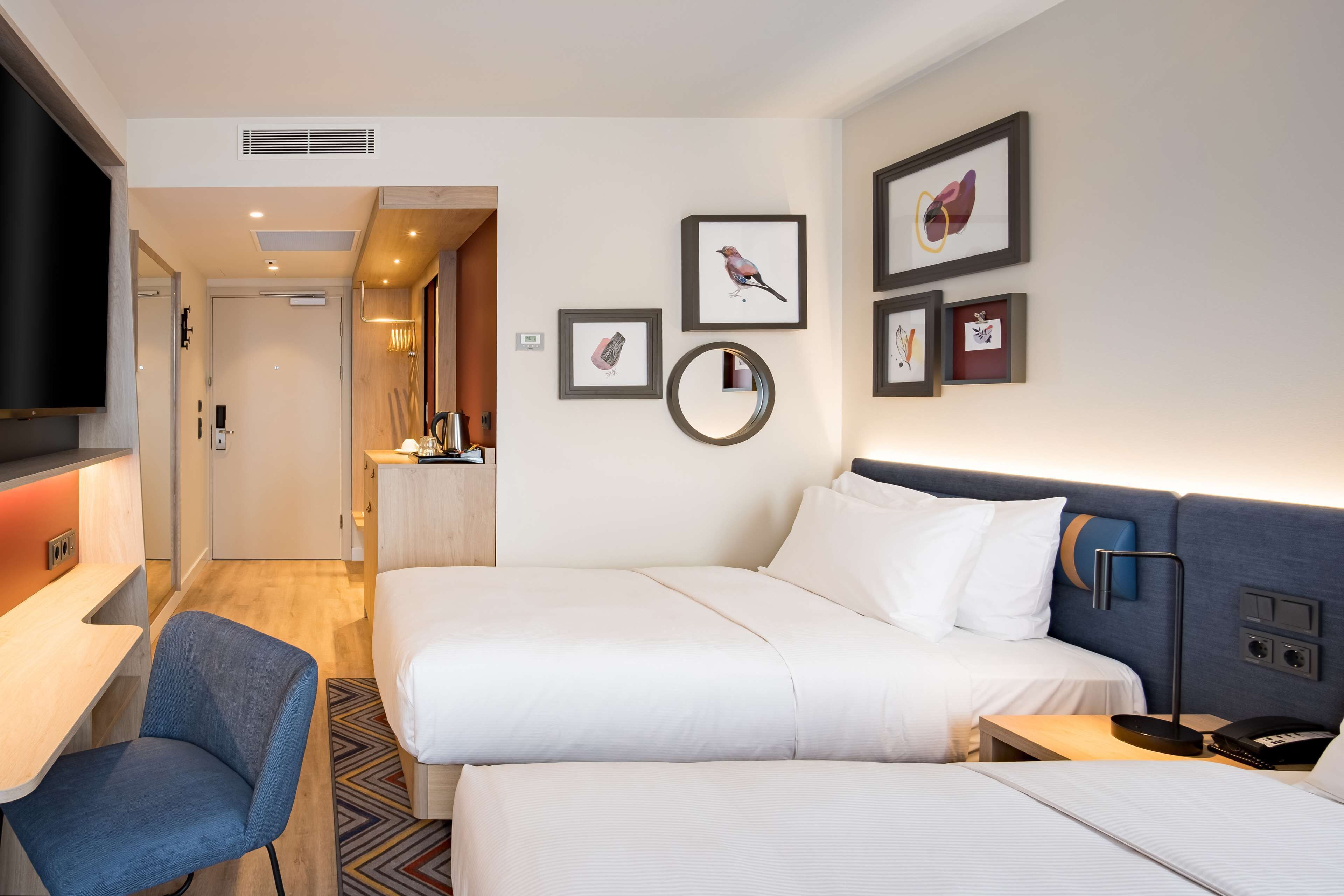 twin room, 2 single beds | in-room safe, soundproofing, iron/ironing board, free cots/infant beds