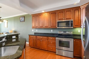Fridge, microwave, oven, stovetop - Belmont Towers 204 by Seaside Vacations & Sales (Ocean City)