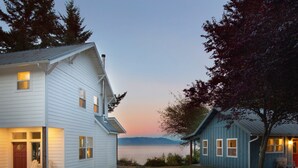 Two houses with a view of a lake and mountains in the background. - Orcas Island, Peapod Cottages with Barn #290B (Orcas Island)