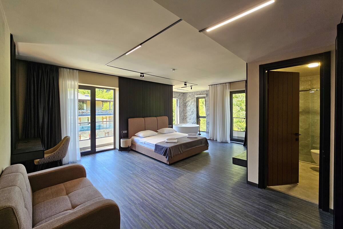 Quarto executivo | Roupas de cama antialérgicas, quartos à prova de som, Wi-Fi de cortesia