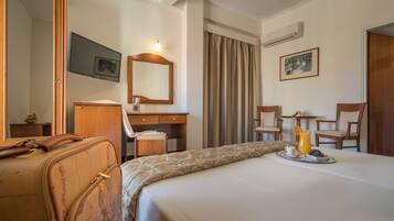1 bedroom, desk, iron/ironing board, travel cot