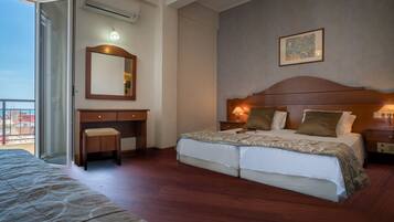 1 bedroom, desk, iron/ironing board, travel crib