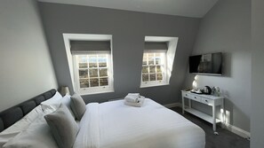 Chambre Double Deluxe | Fer et planche à repasser