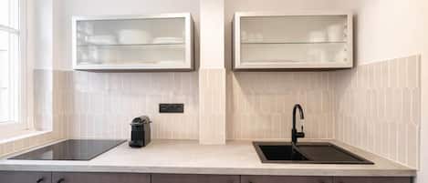 Fridge, microwave, stovetop, coffee/tea maker