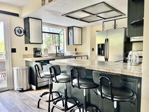 Fridge, microwave, oven, stovetop - 4BR Home w/ BBQ, Trampoline, Game Room (Reno)