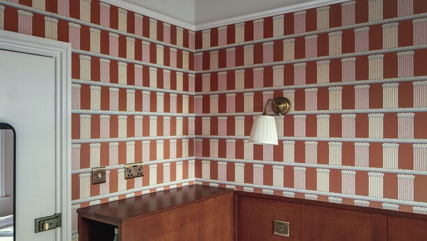 A room with a bed, a wardrobe, and a patterned wallpaper. - St. David's Hotels (London)