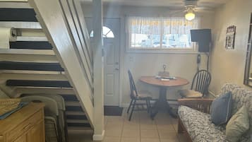 Family Townhome | Living area | 32-inch flat-screen TV with cable channels, TV