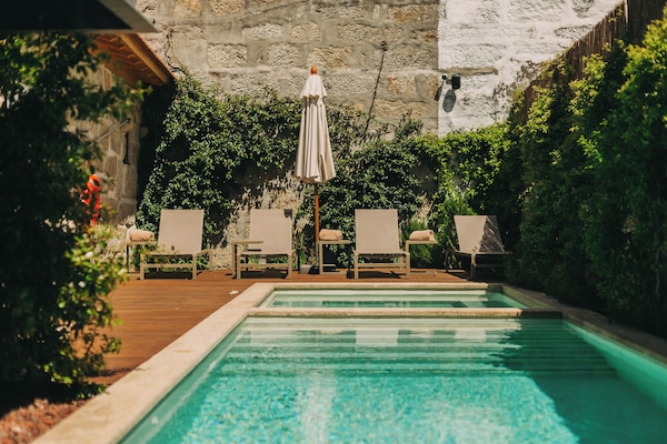 Outdoor pool, open 8:00 AM to 8:00 PM, sun loungers