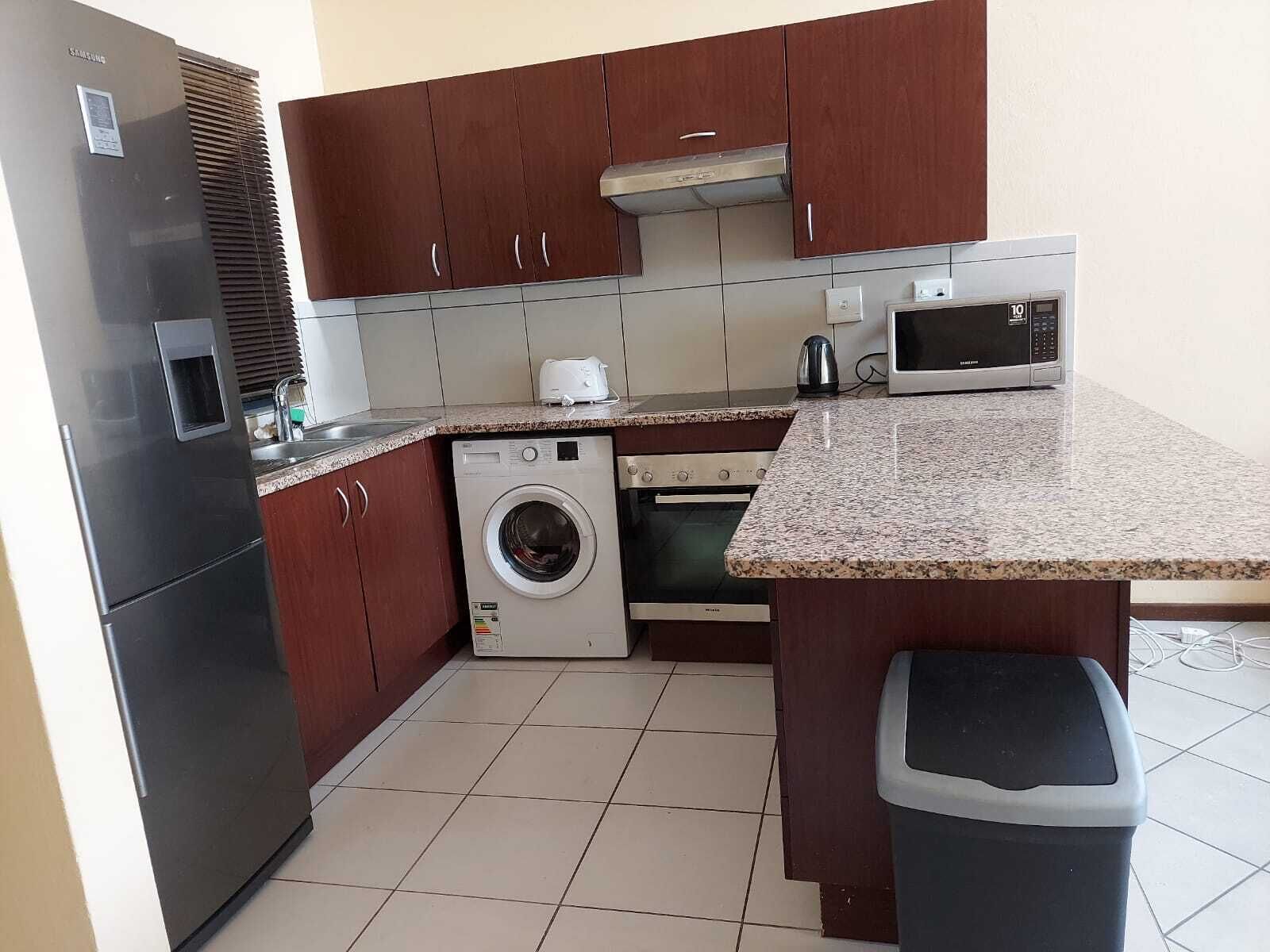 Apartment with Lush green garden and a Pool