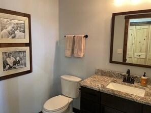 Bathtub, towels, toilet paper