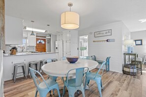 Dining - Beautifully renovated 4 bedroom canal home with boat dock and close beach access! (Supply)