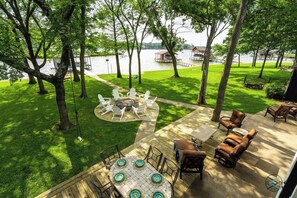 Outdoor dining - Cedar Creek Lake House w/Party Deck & Vast View! (Enchanted Oaks)