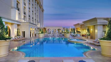 Indoor pool, seasonal outdoor pool, pool umbrellas, sun loungers