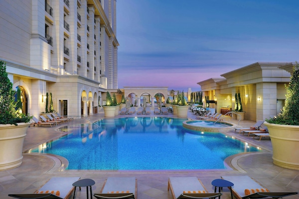 Indoor pool, seasonal outdoor pool, pool umbrellas, sun loungers