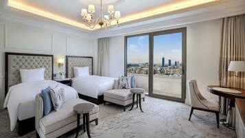 Premium bedding, down comforters, minibar, in-room safe