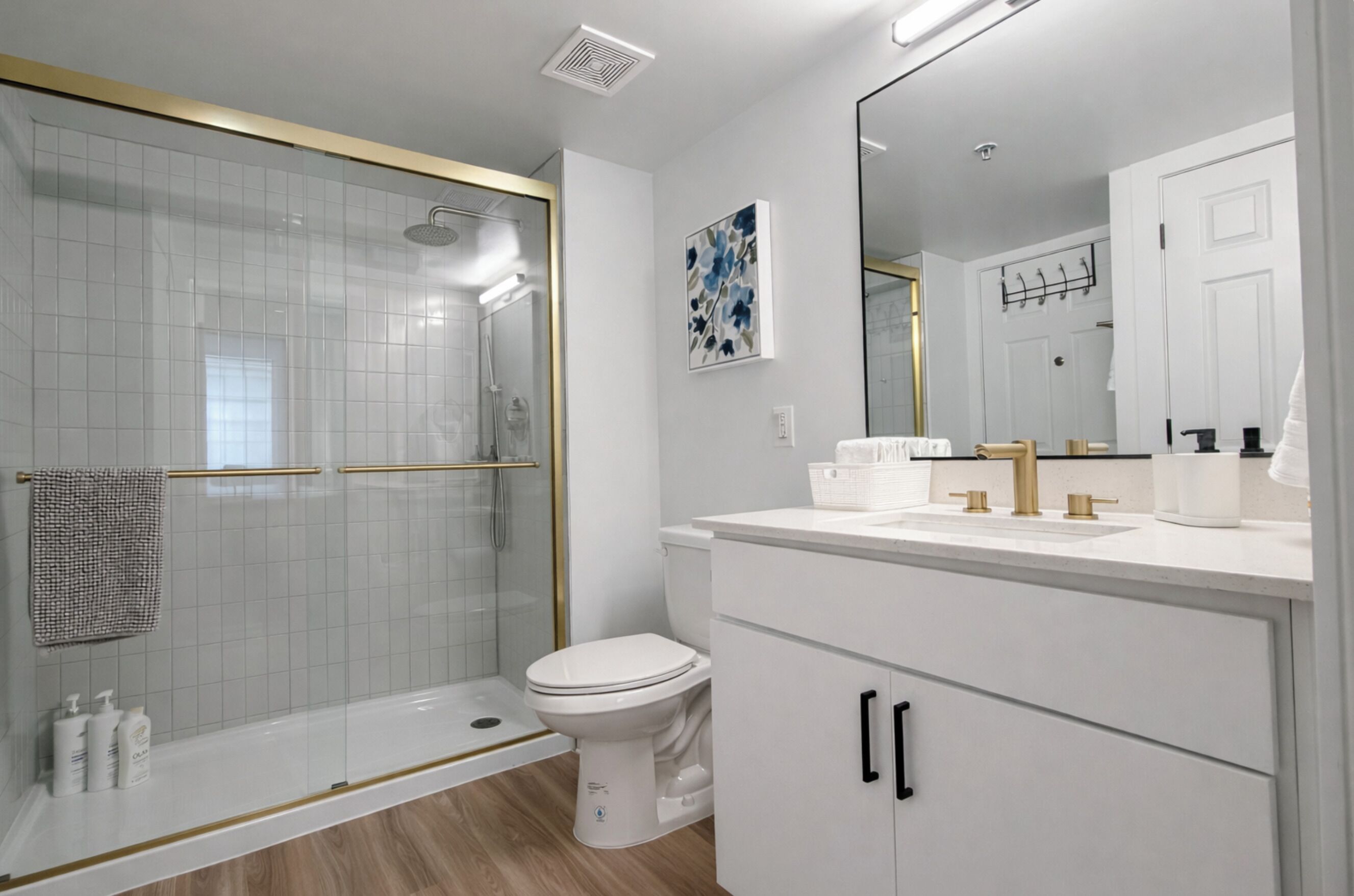 Combined shower/tub, hair dryer, towels, soap