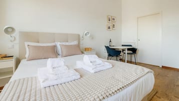 Desk, iron/ironing board, internet, bed sheets