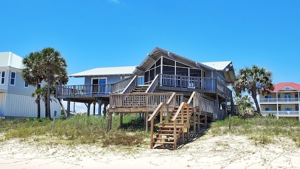 Enjoy stunning ocean views from the spacious balcony of this beachfront property.
