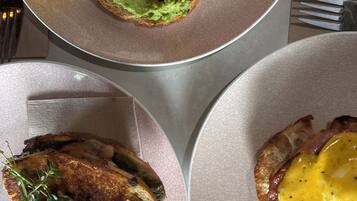 Three plates of food with different toppings.