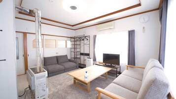 Comfort Condo | Ruang tamu | TV skrin rata