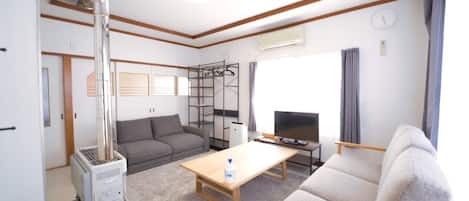 Comfort Condo | Living area | Flat-screen TV
