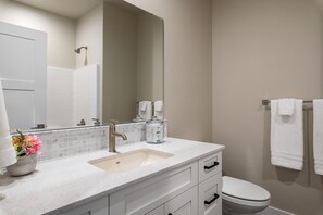 Combined shower/bathtub, hair dryer, towels, soap - Seasons Guest Home (Caldwell)