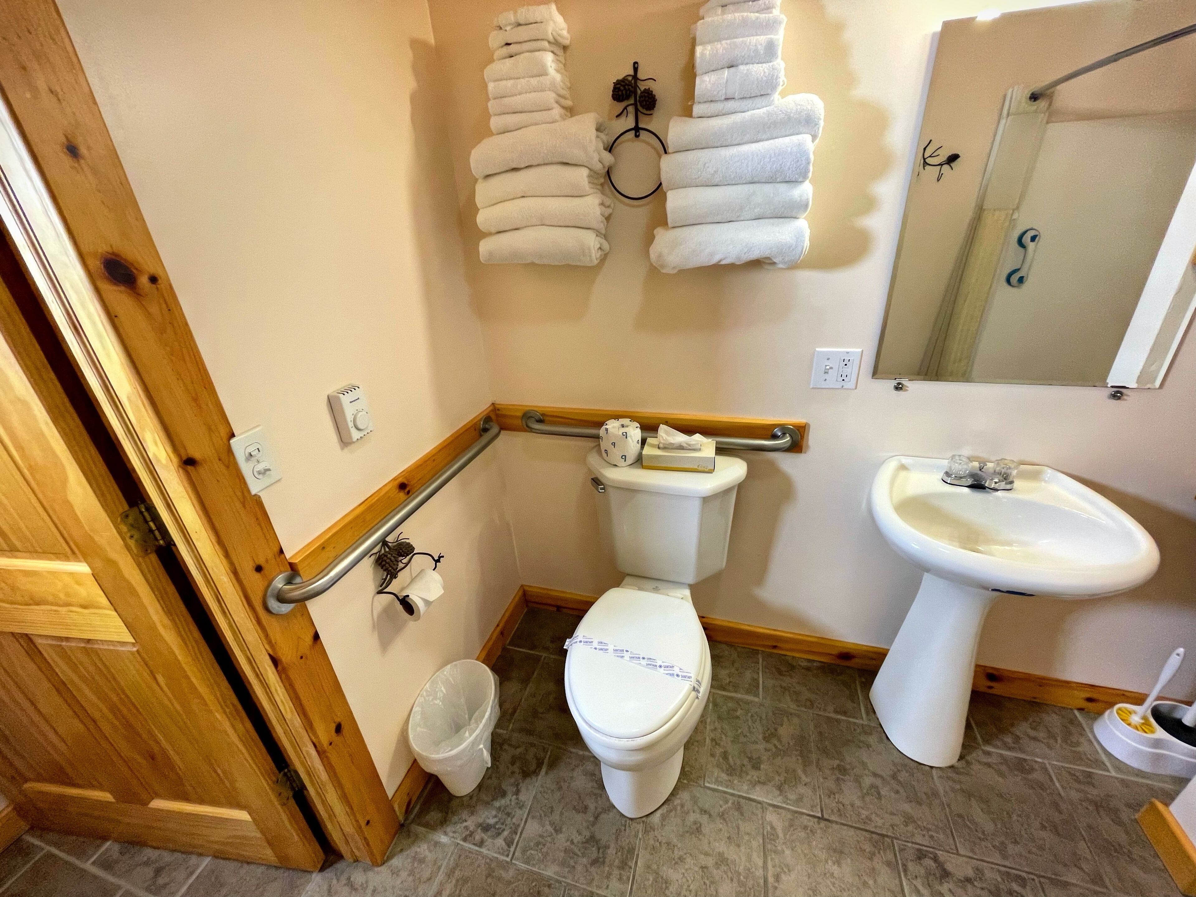 Combined shower/bathtub, hair dryer, towels, soap