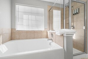 Combined shower/tub, hair dryer, towels, soap