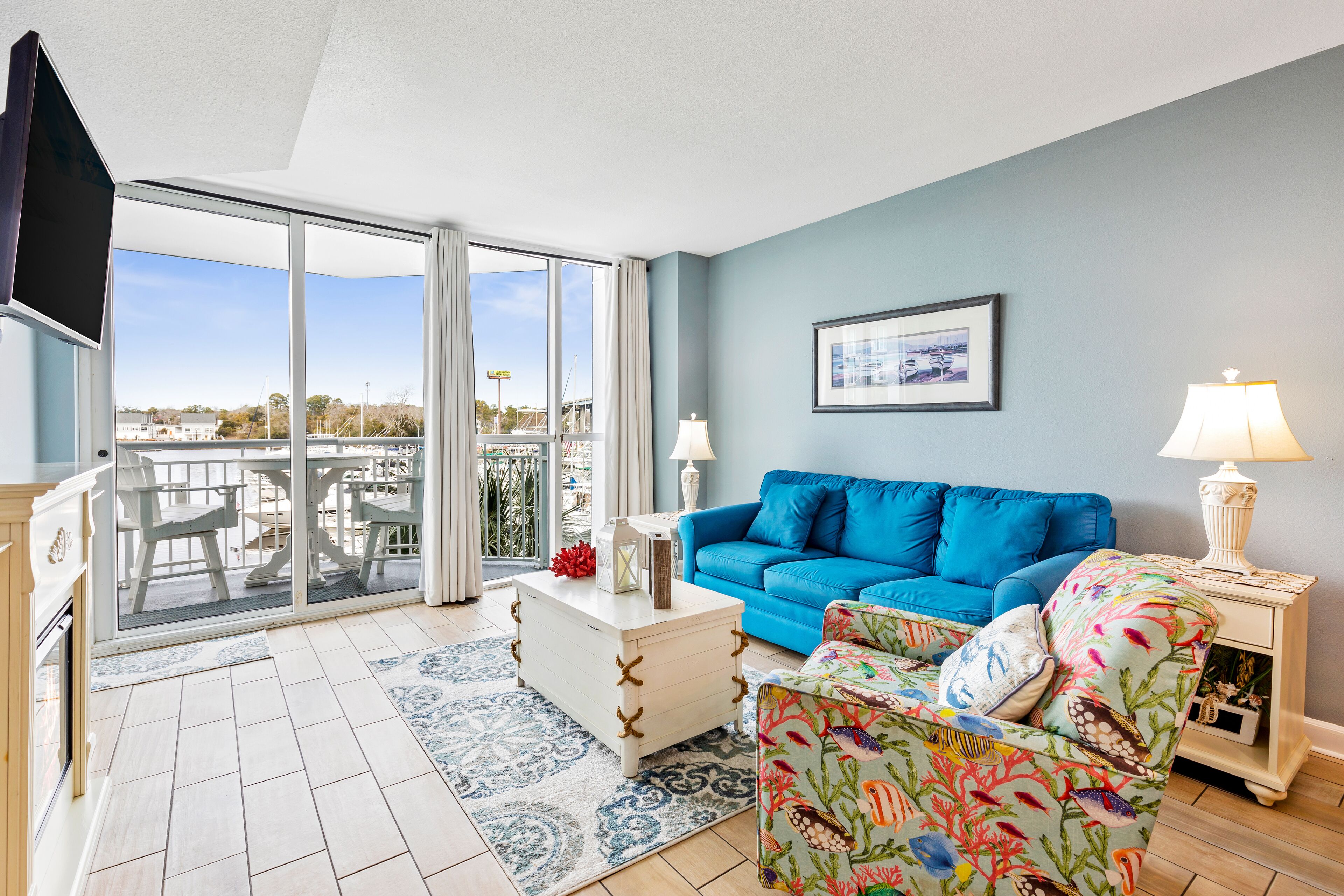 Waterfront wonder with balcony overlooking the marina, pool & hot tub