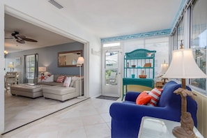 Sunroom off the main living area with access to the outdoor patio - Siesta Key Villa | Pool + Free Daily Activities (Siesta Key)