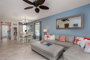 Quality leather corner sofa decorated with cute starfish pillows - Siesta Key Villa | Pool + Free Daily Activities (Siesta Key)