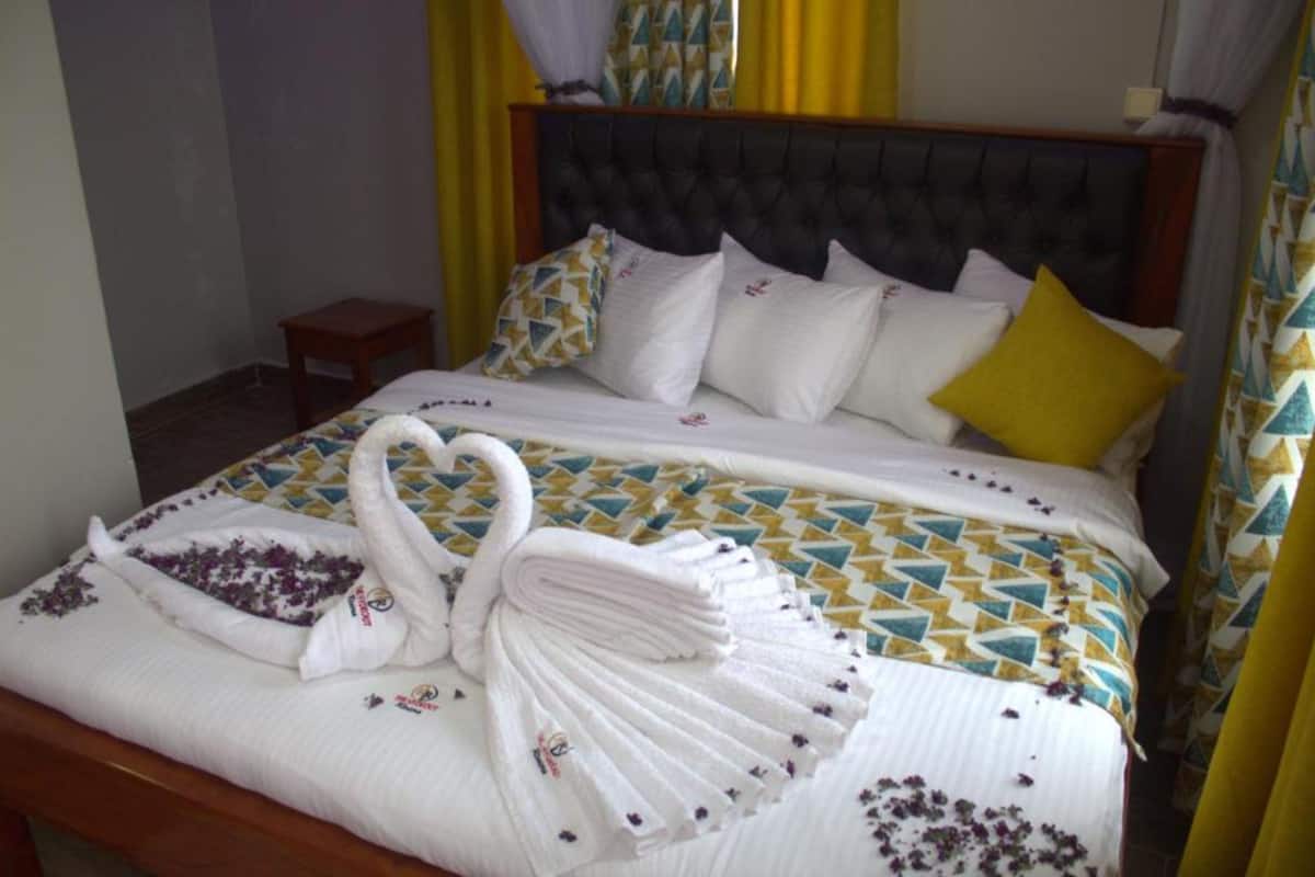 Habitación ejecutiva | Ropa de cama