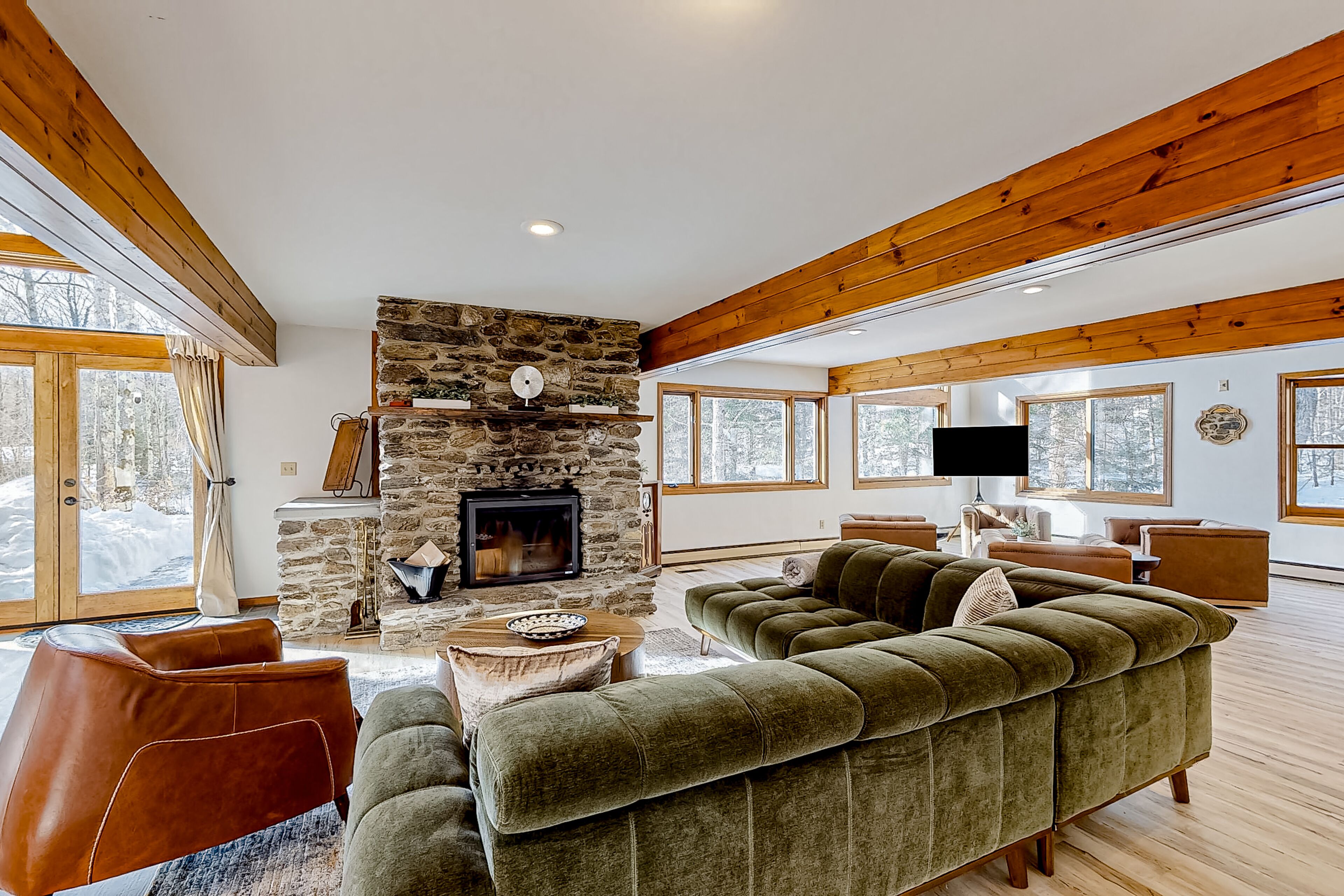 Secluded home on 15 acres with hot tub, sauna, fireplaces, deck & Jay Peak views
