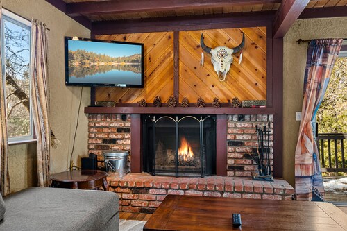 Cozy home with wood-burning fireplace, WiFi, game room, deck, & washer/dryer