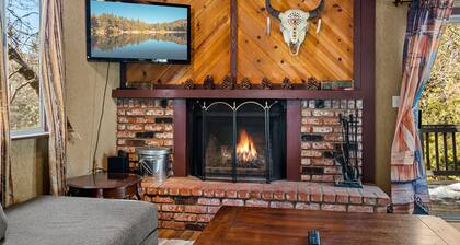 Cozy home with wood-burning fireplace, WiFi, game room, deck, & washer/dryer