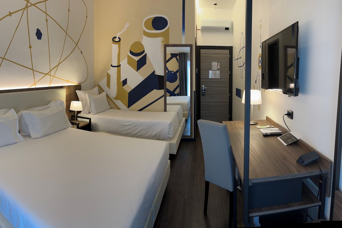 Comfort Room, Multiple Beds | Minibar, in-room safe, desk, laptop workspace