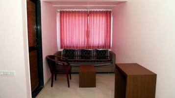 Quarto casal luxo | Área de estar