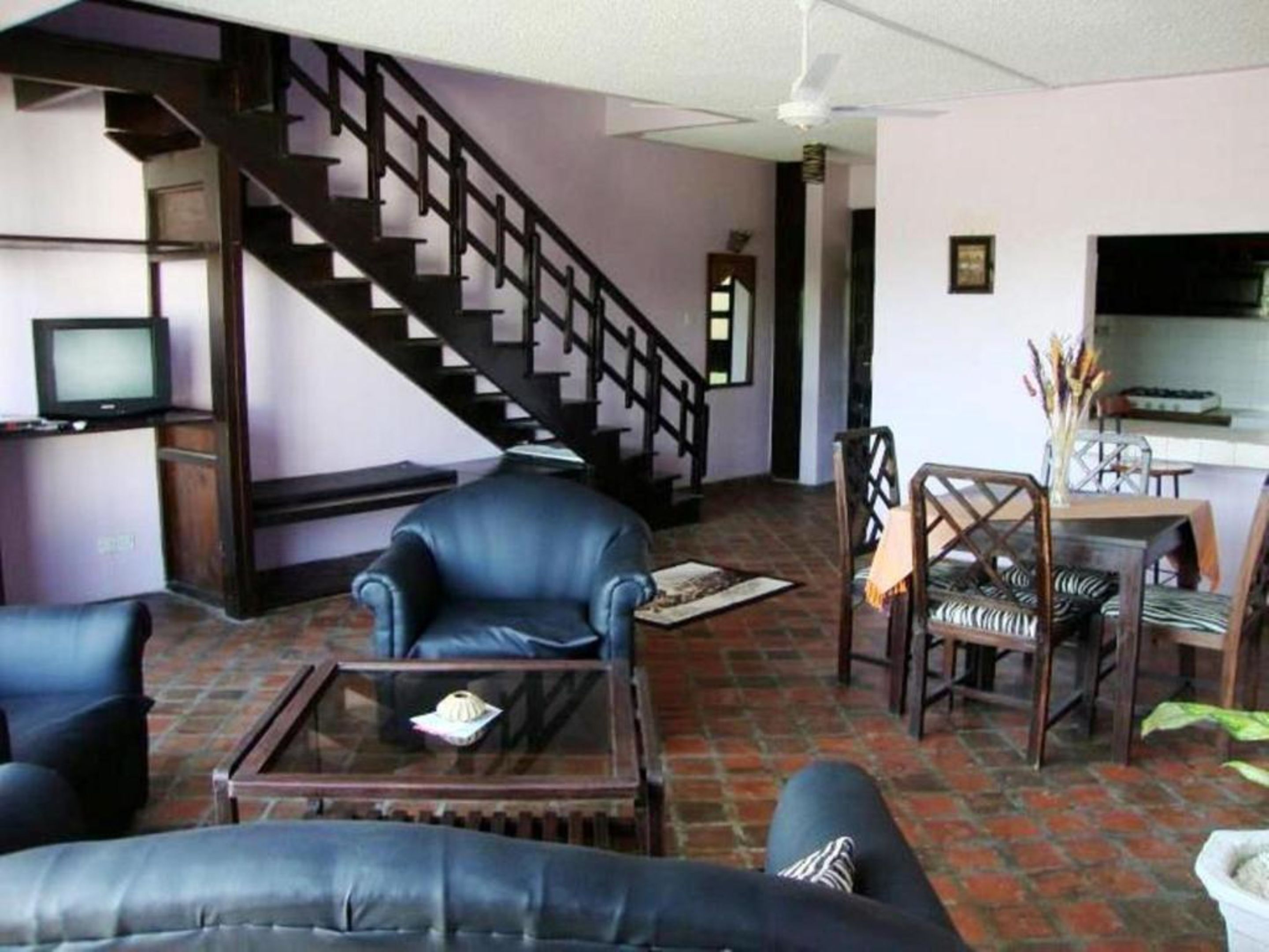 Departamento, 2 habitaciones | Área de sala de estar | Televisión de pantalla plana 