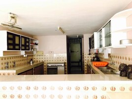 Apartment, 2 Bedrooms | Private kitchen | Full-size fridge, oven, stovetop, electric kettle