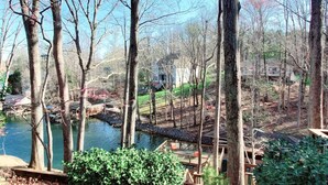A riverside park with walking paths, a wooden deck, and a gazebo. - Private Cove + Dock, Kayaks, Paddleboards, Fire Pit,  Pet-Friendly Lake Escape (Smith Mountain Lake Virginia)