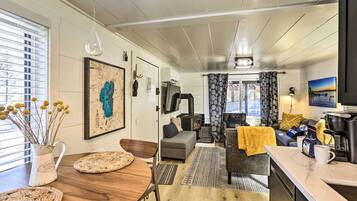 TV, fireplace, books, music library