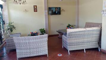 Apartment, 2 Bedrooms | Living area | Flat-screen TV