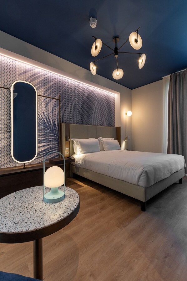 Deluxe Room | Premium bedding, down comforters, in-room safe, blackout drapes