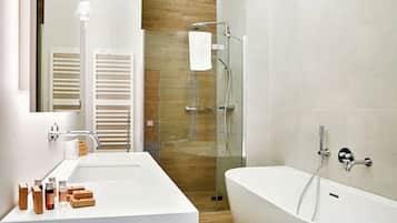 Shower, rainfall showerhead, hair dryer, towels