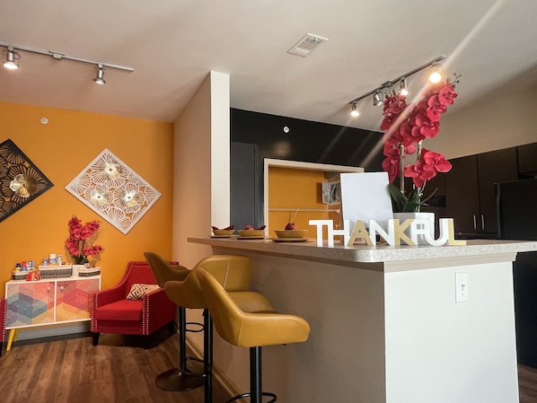 Enjoy cooking and socializing in this well-equipped kitchen with a central island and adjacent dining area.