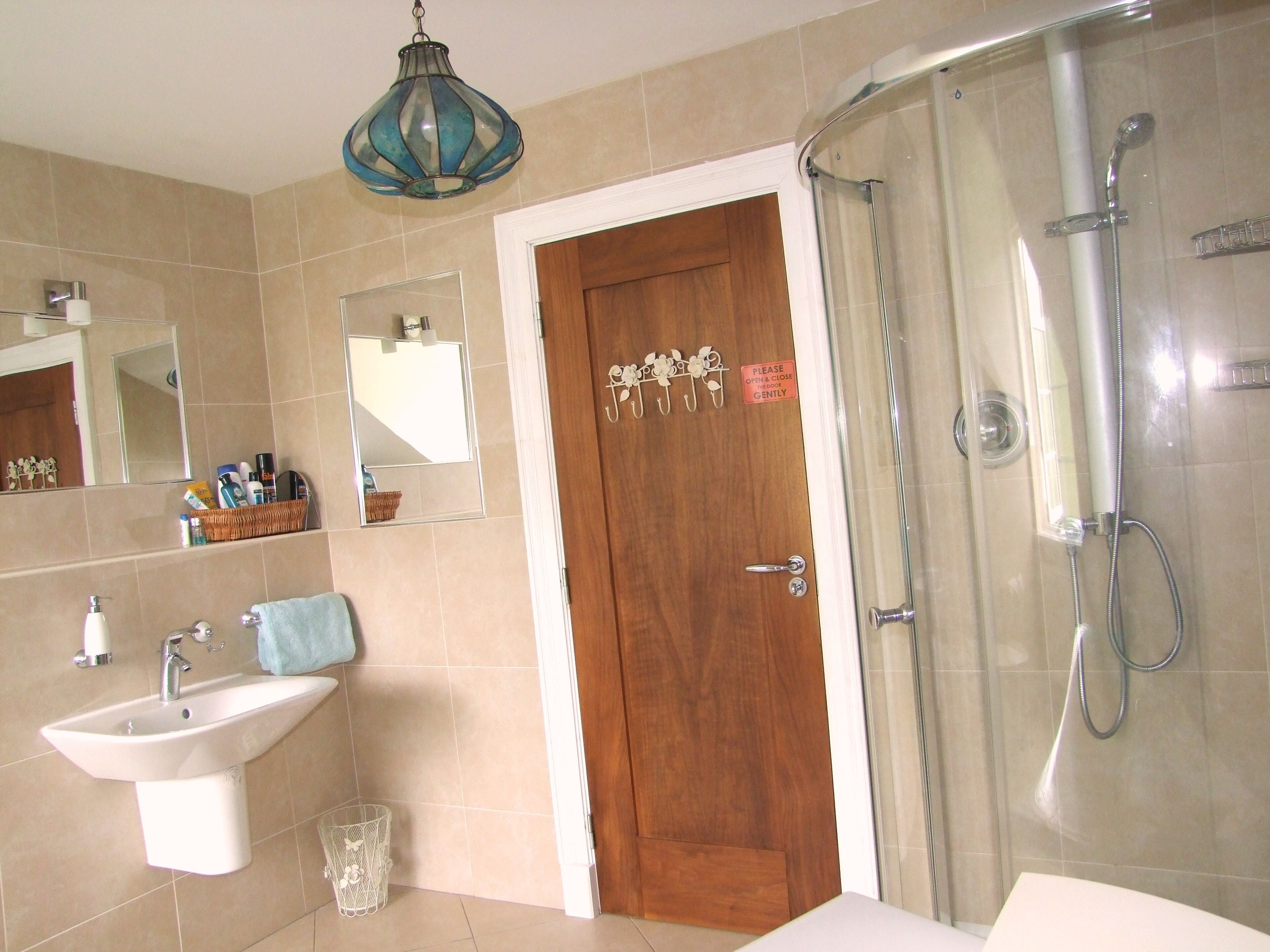 Bathtub, hair dryer, towels, soap