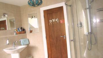 Bathtub, hair dryer, towels, soap