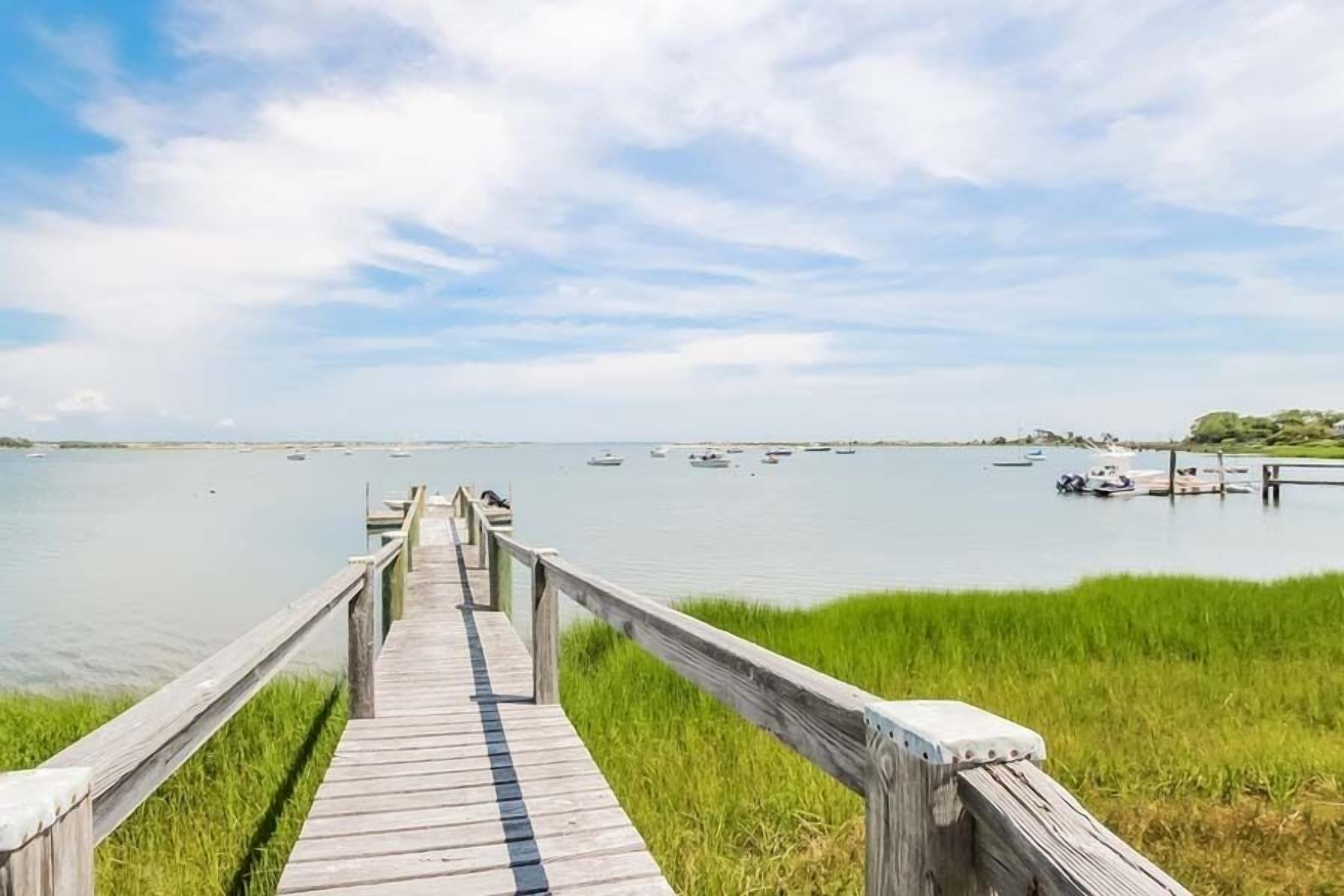 Sun Filled Modern Waterfront luxury rental home with dock! RPMS027